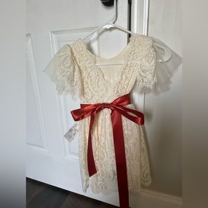 Brand new size 3T dress. Removable sash